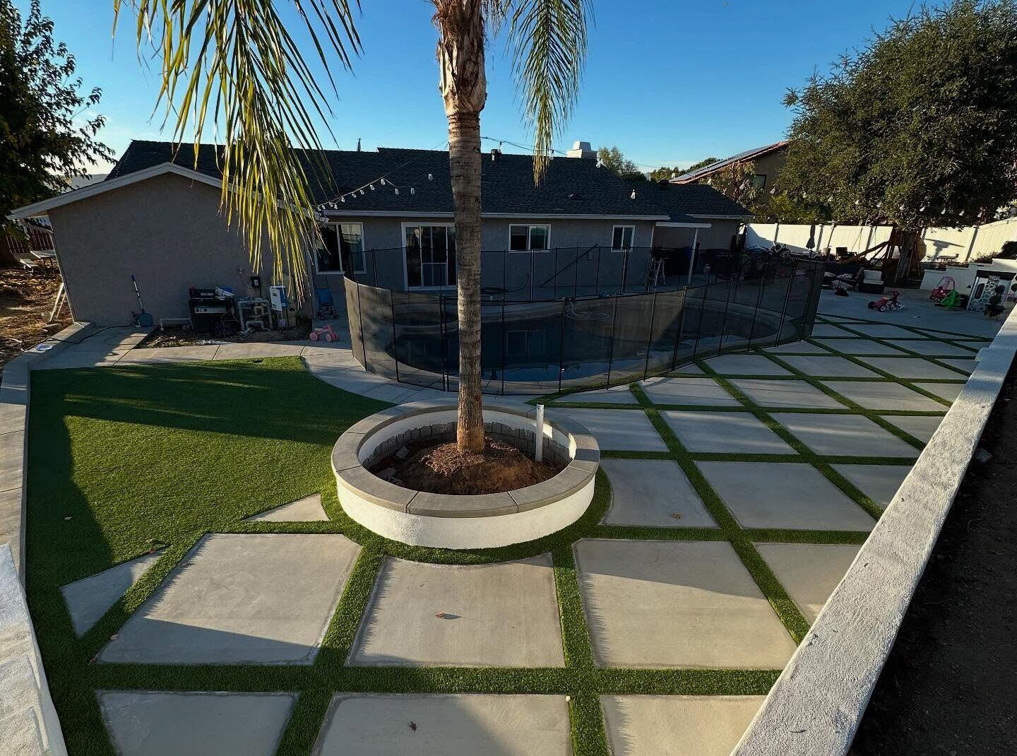 Around the Pool For a fresh take on designing your new swimming pool and patio area, consider an artificial turf lawn for the deck instead of traditional materials like pavers or concrete. A lush green extending around your pool can give you a softer and more organic look for your outdoor living space while providing you with a great overall monetary value.